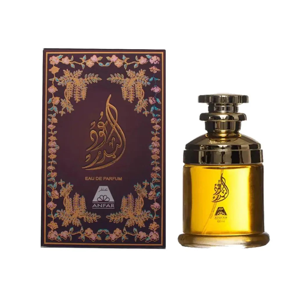 Oudh Al Badar by Oudh Al Anfar 60ml Eau de Parfum with a luminous golden amber bottle, smoked bronze metallic cap and deep plum burgundy floral presentation box