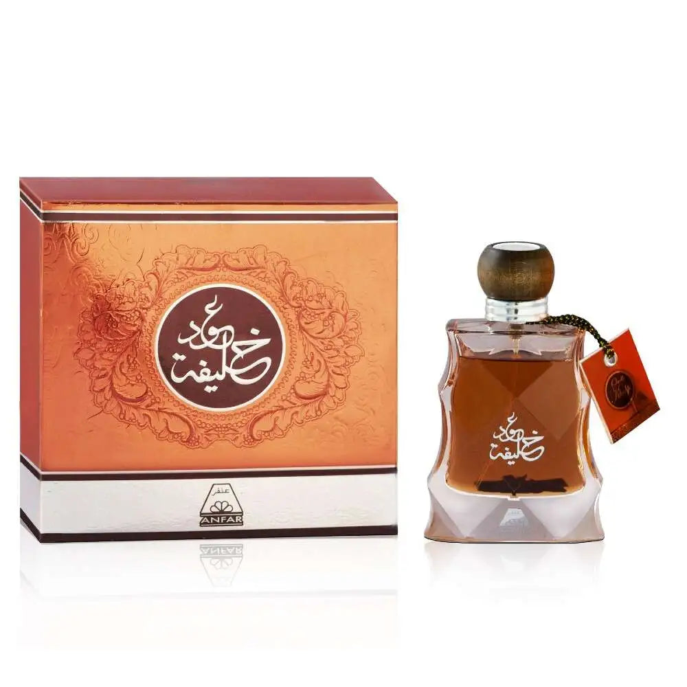 Oudh Khalifa Gold by Oudh Al Anfar 100ml Eau de Parfum with copper-amber liquid in a clear faceted bottle, dark wooden cap, polished chrome collar and coordinating burnt-copper presentation box