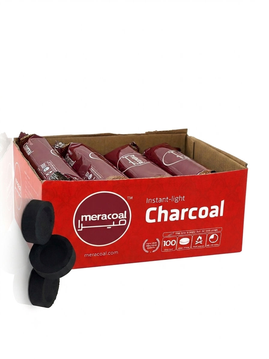 Meracoal instant-light charcoal in a red cardboard display box with several black charcoal discs placed in front on a white background.